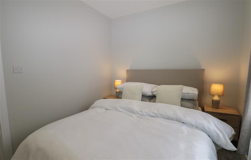 One of the bedrooms at 4A One Bed Apartment with patio and private entrance, Seaford