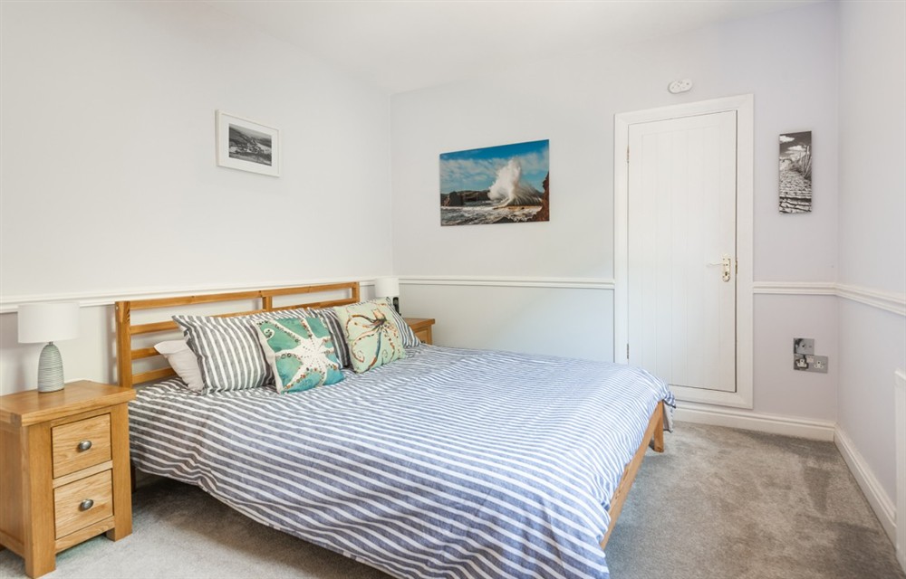 A bedroom in 5 Armada House (photo 2) at 5 Armada House in Hope Cove