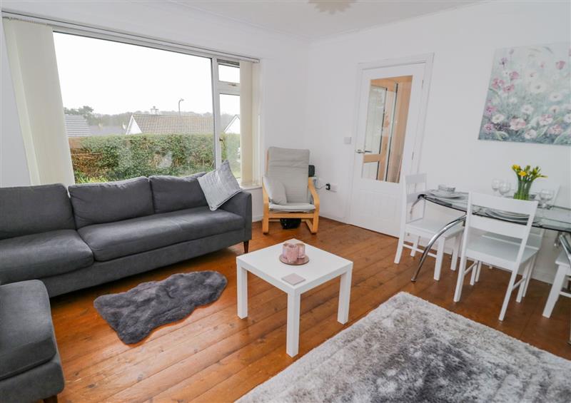 Relax in the living area at 5 Breeze Hill, Benllech