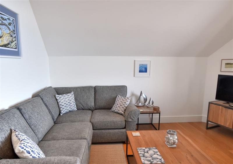 Relax in the living area at 5 Coram Tower, Lyme Regis