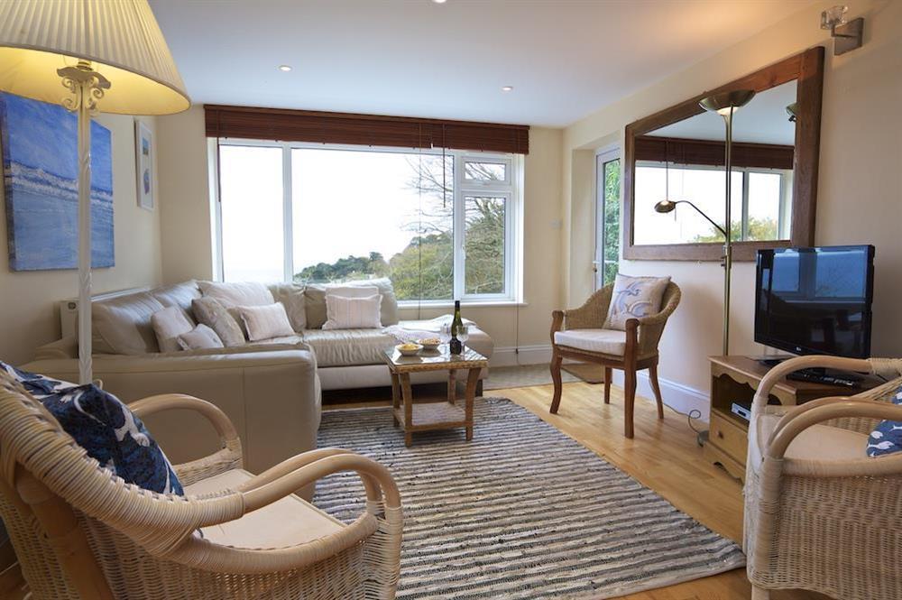Light and airy open-plan sitting room with views over South Sands and Salcombe estuary at 5 Grafton Towers in North Sands, Salcombe