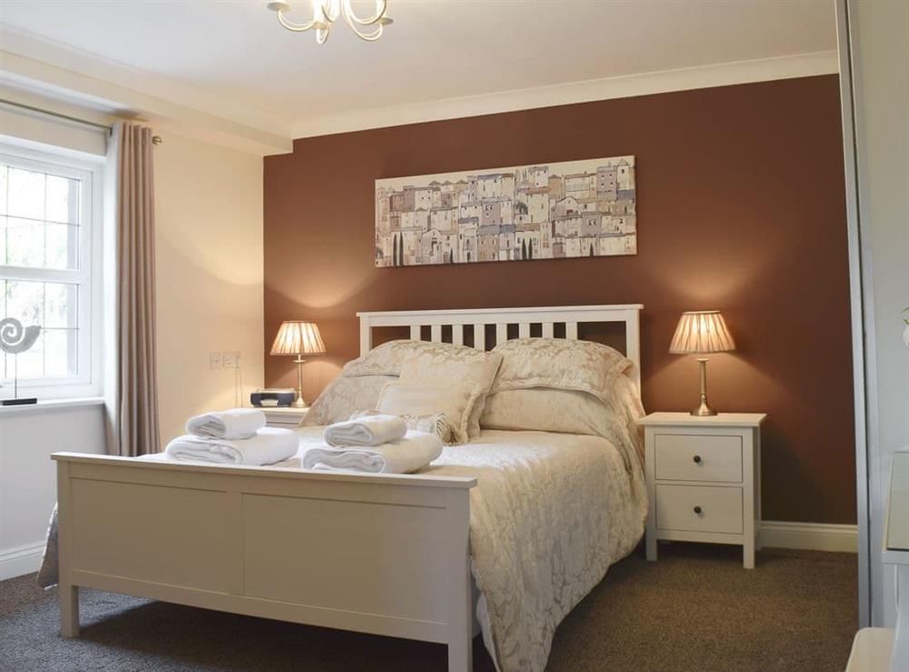 Comfortable double bedroom at 5 Ladstock Hall (Deluxe) in Keswick, Cumbria