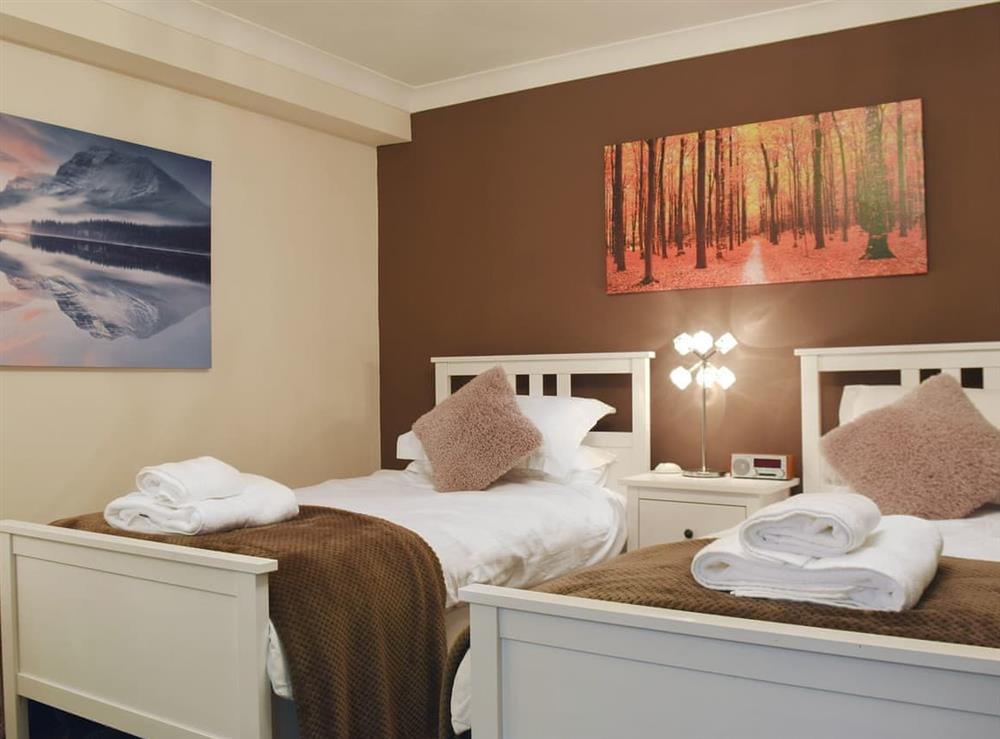 Comfy twin bedroom at 5 Ladstock Hall (Deluxe) in Keswick, Cumbria