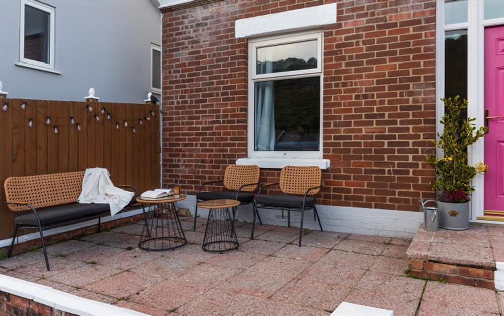 Front terrace with table and seating at 5 Lower Fairview Road in Dartmouth
