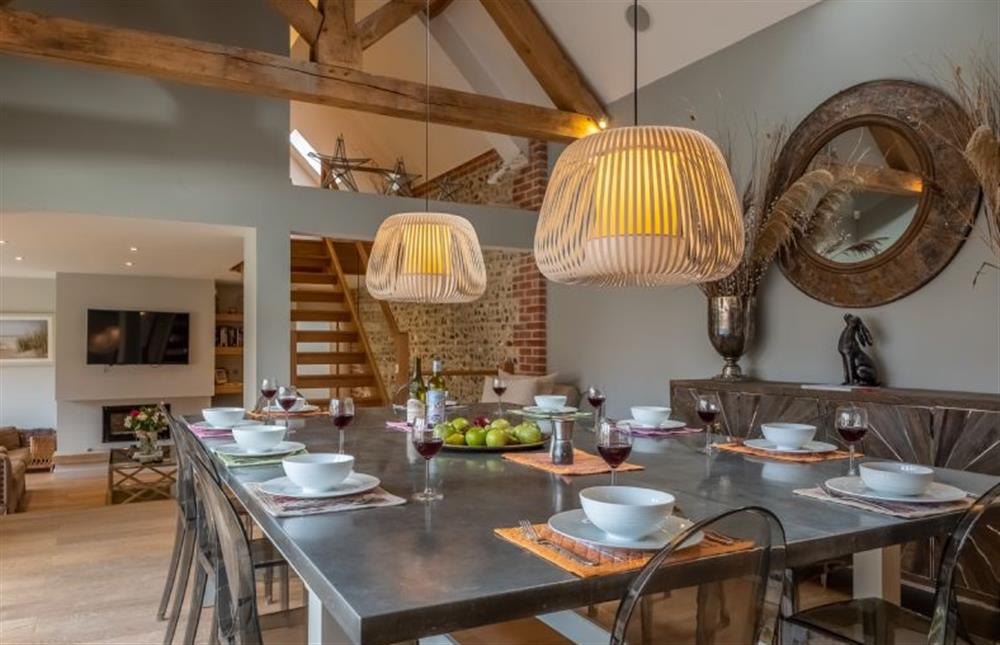 The dining area, with table seating up to 16 guests  at 5 Manor Farm Barns, Brancaster