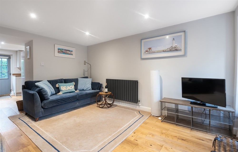 Relax in the living area at 5 Orchard Terrace in Slapton