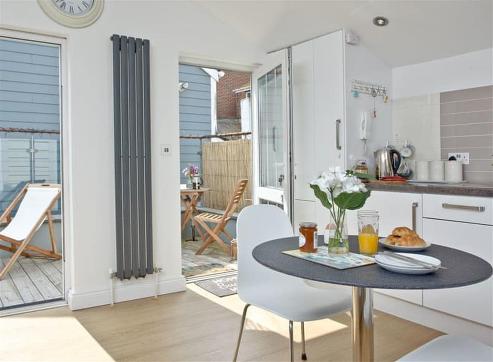 Charming kitchen/ dining area at 5 Park Mews in Weymouth, Dorset