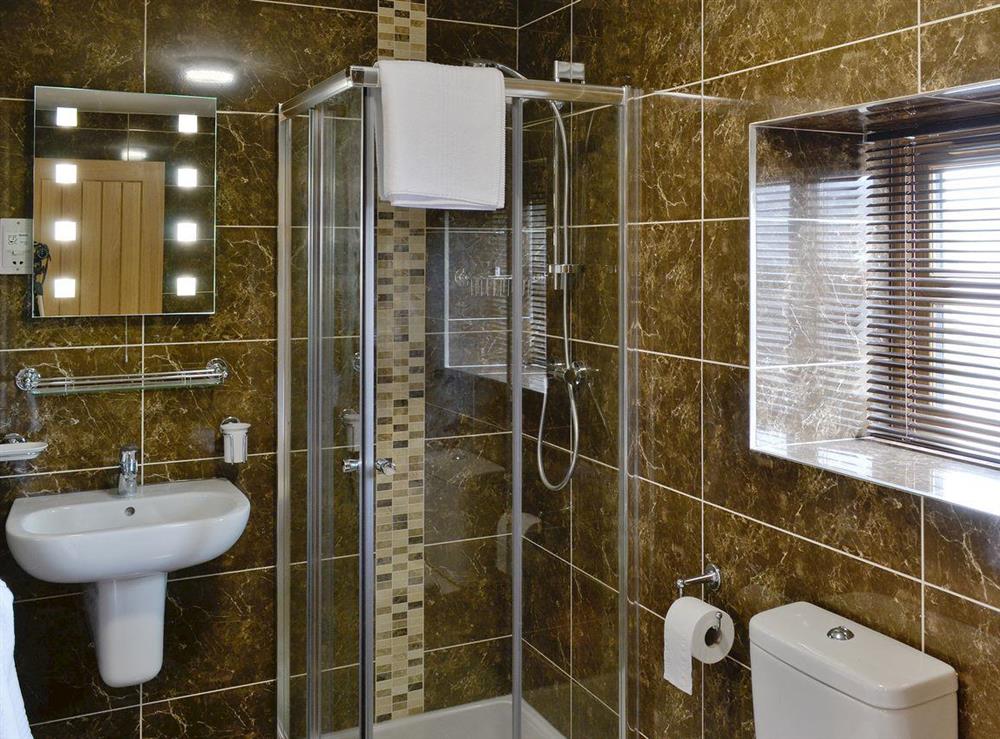 Modern bathroom with separate bath and shower cubicle at 5 The Granary in Pendleton, near Clitheroe, Lancashire