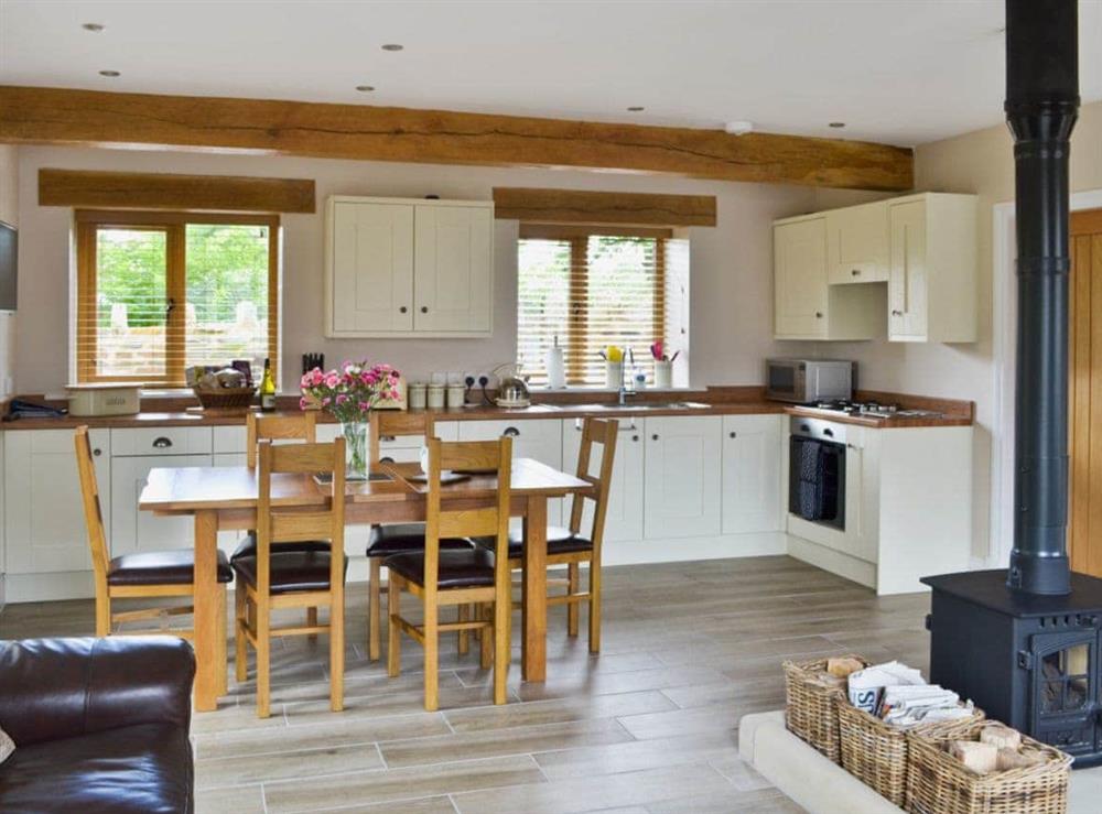Well-equipped kitchen with convenient dining area at 5 The Granary in Pendleton, near Clitheroe, Lancashire