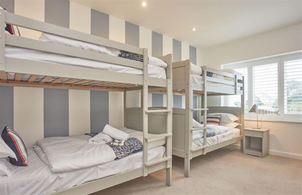 Bedroom three with two bunk beds suitable for 12 years and younger at 5 The Sands, Polzeath