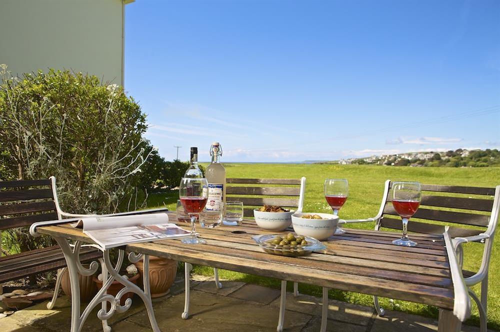 Sit out on the covered patio and take in the views at 5 Thurlestone Beach Apartments in Thurlestone, Nr Kingsbridge