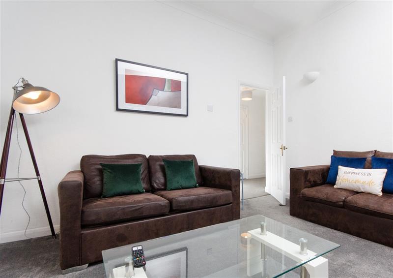 Relax in the living area at 53A Hampton Road, Scarborough