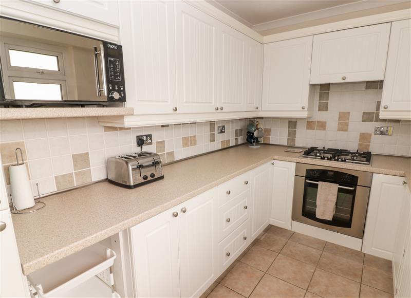 This is the kitchen at 54 Croft Court, Tenby