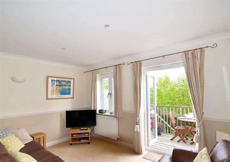 Relax in the living area at 54 Henrys Way, Lyme Regis