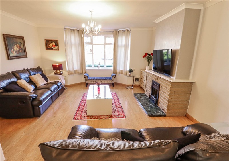Relax in the living area at 55 Broadway, Lincoln