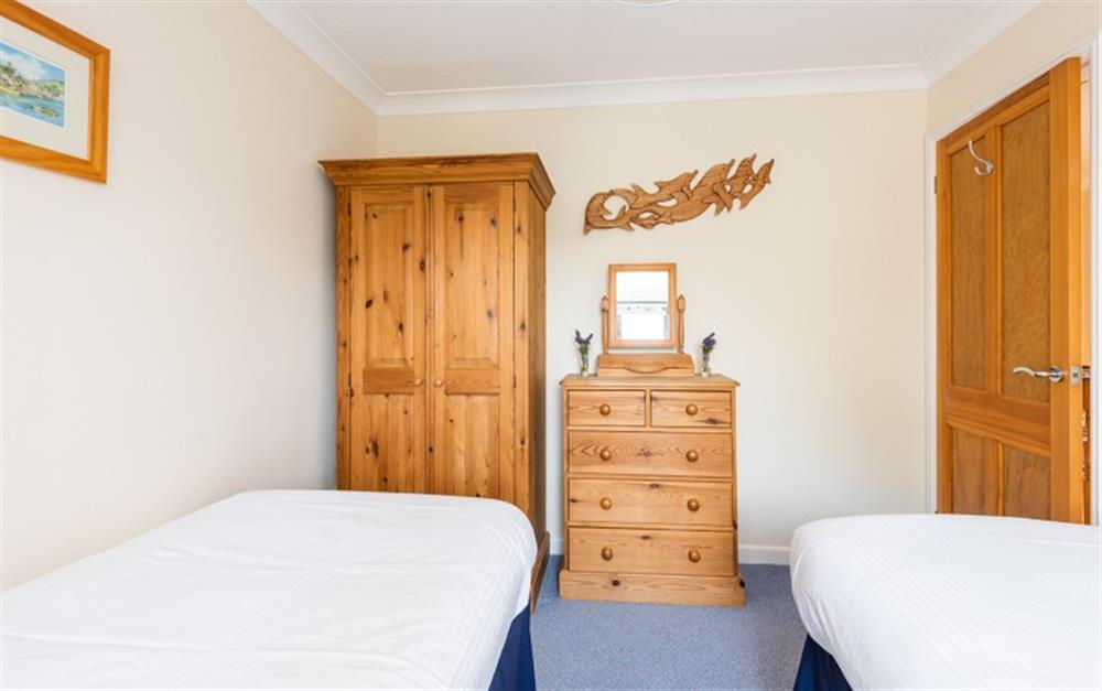 Plenty of wardrobe and space and drawers in the twin bedroom at 55 Upper Maen Cottage in Maenporth