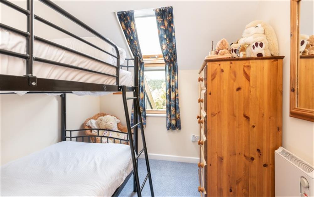 The third bedroom has bunk beds at 55 Upper Maen Cottage in Maenporth