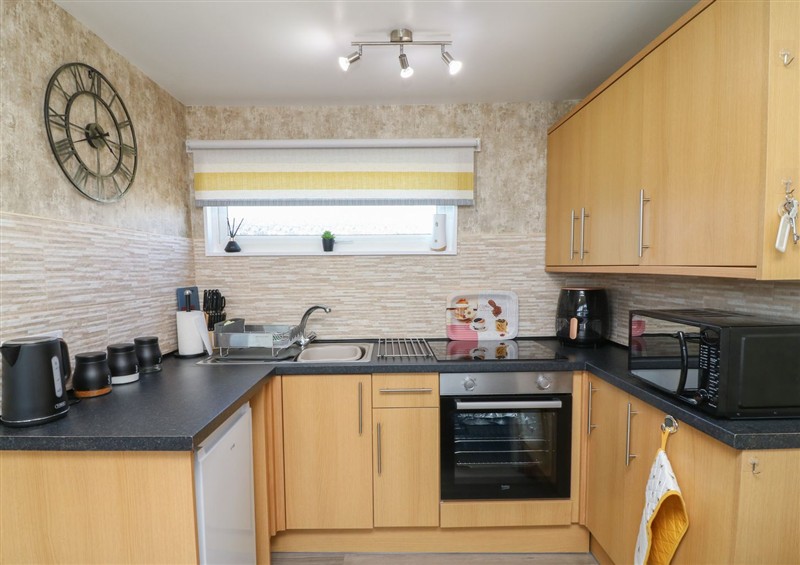 Kitchen at 56 Cherry Park Chalet, Chapel St Leonards