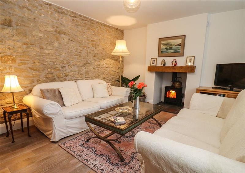 Relax in the living area at 57 Bradley Street, Wotton-Under-Edge