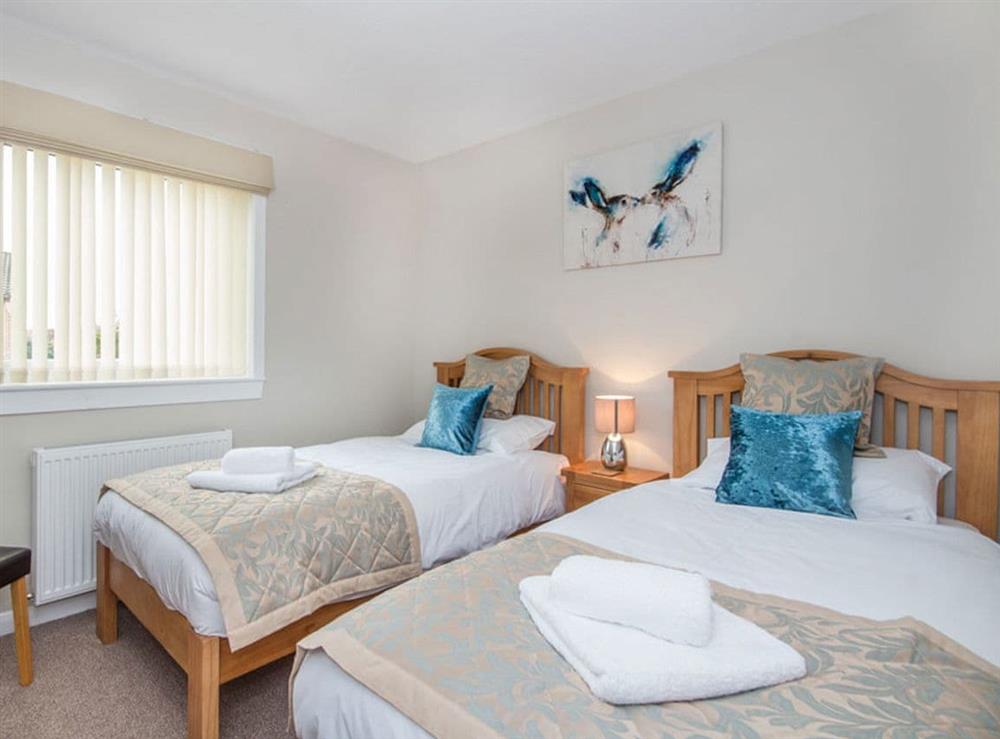 Twin bedroom at 58 Moray Park in Culloden, Inverness-Shire