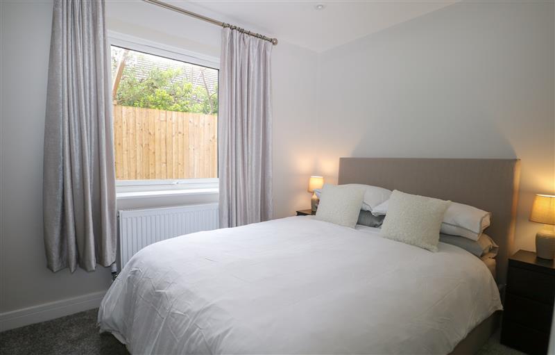 A bedroom in 5A One Bed Apartment with patio and  private entrance at 5A One Bed Apartment with patio and  private entrance, Seaford