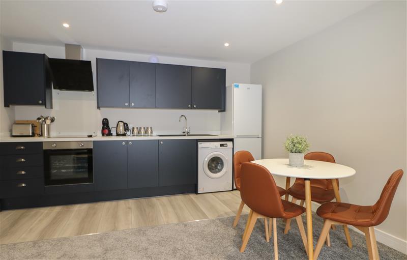 This is the kitchen at 5A One Bed Apartment with patio and  private entrance, Seaford
