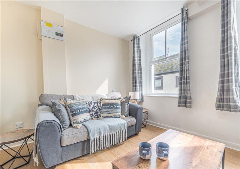 Relax in the living area at 5A Queen Street, Whitehaven