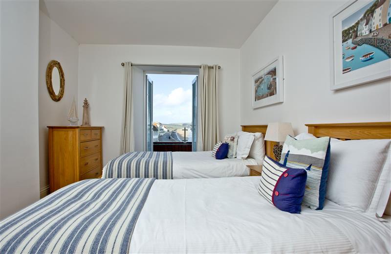 A photo of the bedroom at 6 At The Beach, Devon