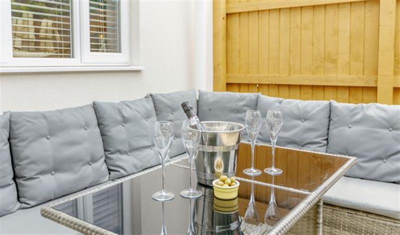 Relax in the living area (photo 5) at 6 Chatterton Mews, Lyme Regis