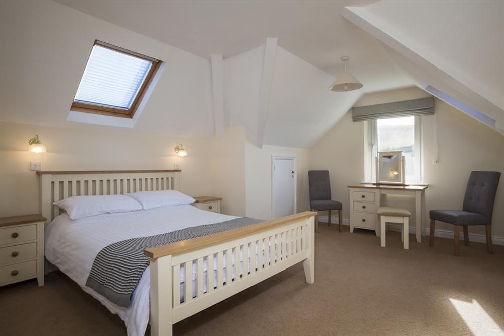 Spacious master bedroom with new (2017) King-size bed (photo 2) at 6 Chichester Court in Hope Cove, Nr Kingsbridge