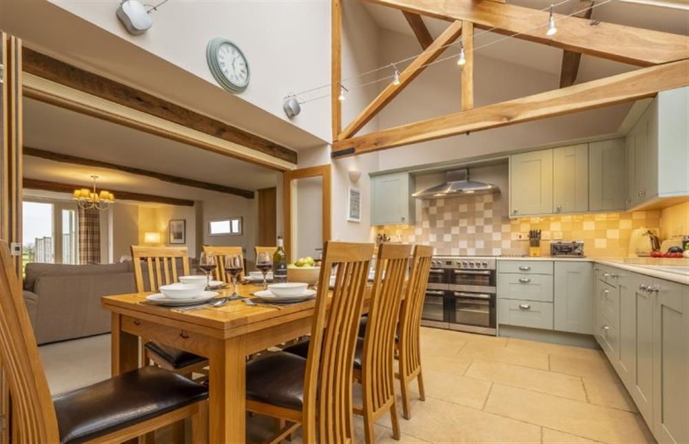 Contemporary kitchen and dining for eight guests at 6 Courtyard Barn, Docking