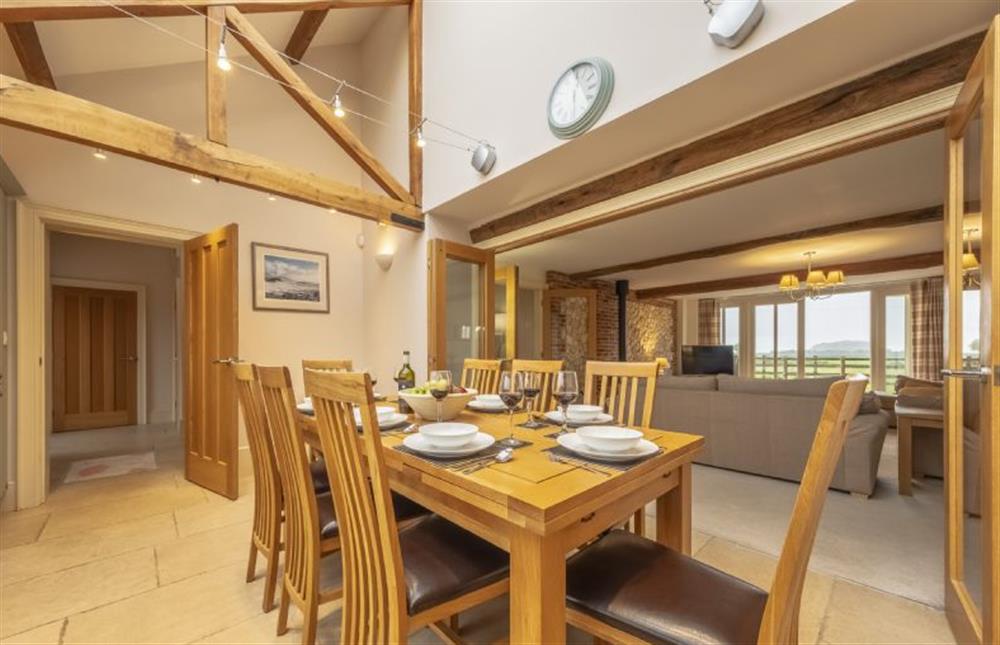 Dining with access to the sitting room at 6 Courtyard Barn, Docking