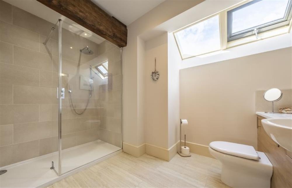 Master bedroom en-suite with walk-in shower at 6 Courtyard Barn, Docking