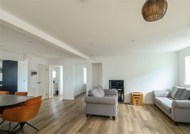 Relax in the living area (photo 2) at 6 Gwelfor Estate, Cemaes Bay