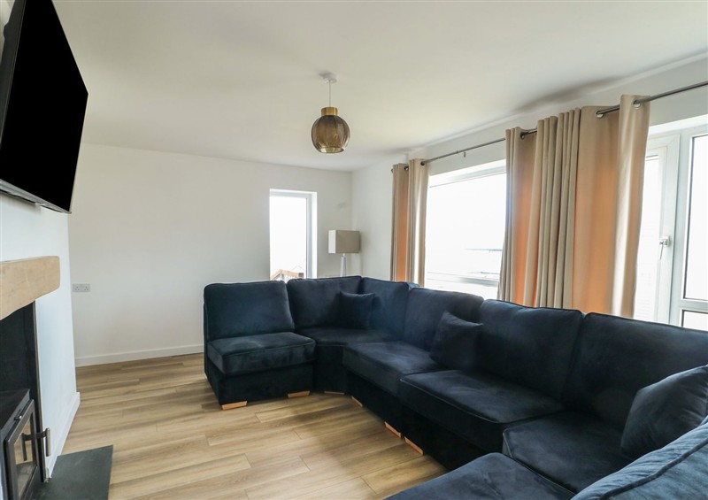 Relax in the living area at 6 Gwelfor Estate, Cemaes Bay