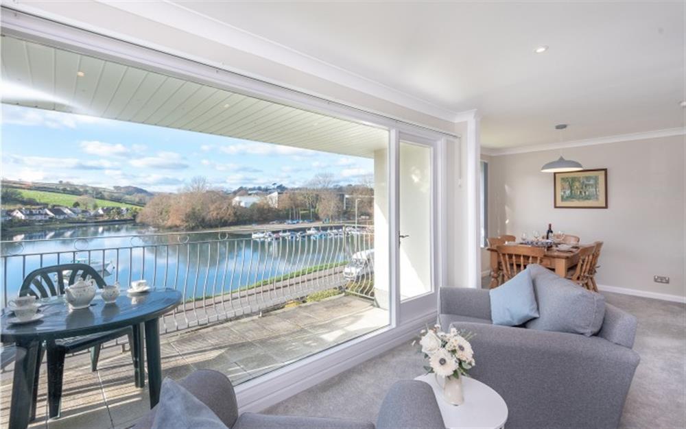 The lounge, complete with comfy armchairs, perfectly positioned to enjoy the view!  at 6 Riverside in Kingsbridge