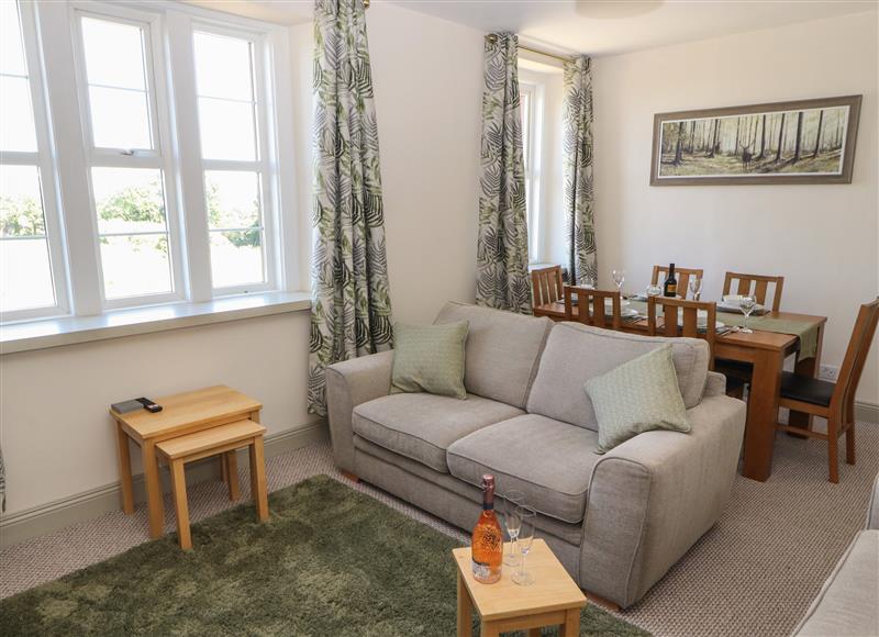 Relax in the living area at 6 Rose Bank Cottages, Dalston