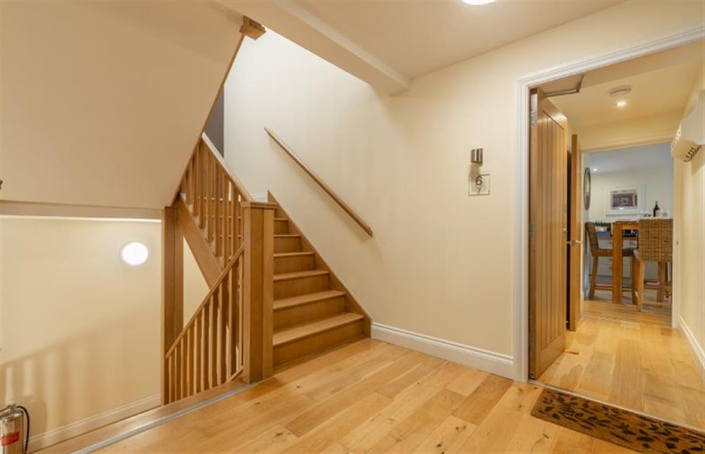 The entrance hall and stairs to your apartment