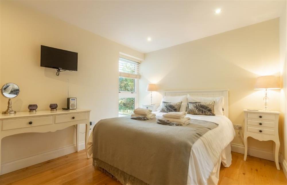The master bedroom has a wall mounted Smart television at 6 Sandy Lane, Carbis Bay