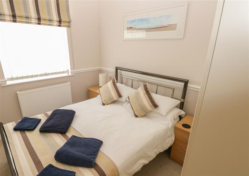 One of the bedrooms at 6 South Beach Court, Tenby