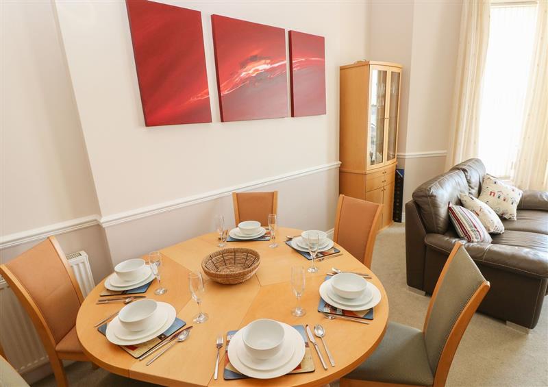 The dining area at 6 South Beach Court, Tenby