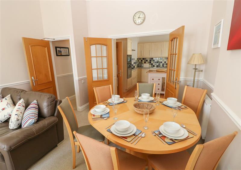 This is the dining room at 6 South Beach Court, Tenby