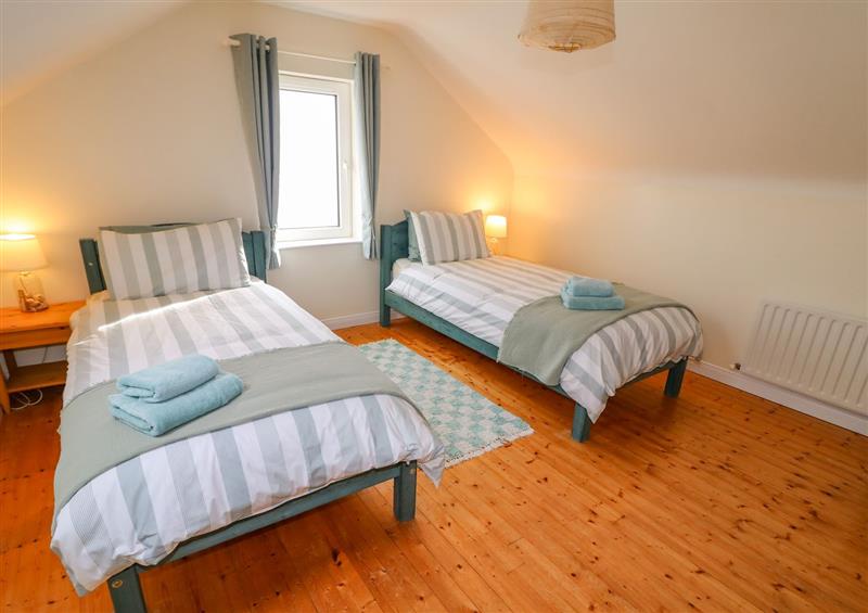 A bedroom in 6 Strandview Cottages at 6 Strandview Cottages, Castlerock