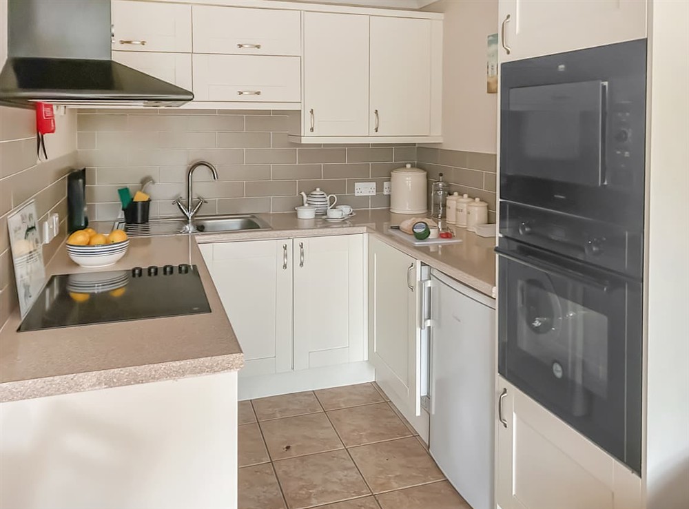 Kitchen area (photo 2) at 6 The Cove in Mullion, Cornwall