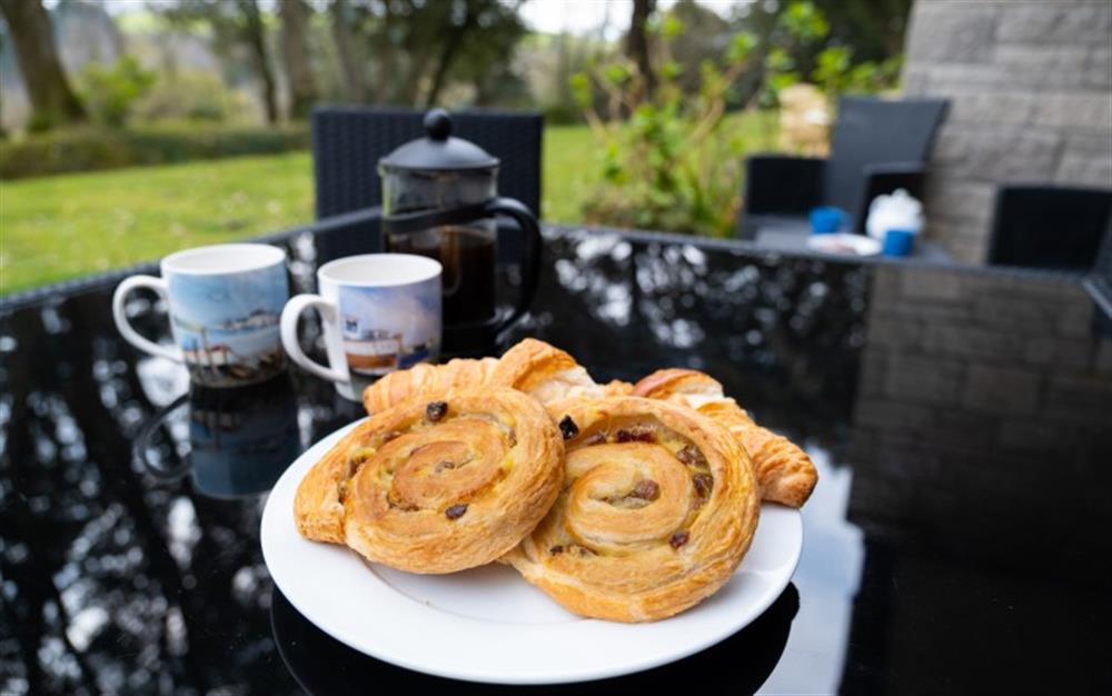 Croissants or a Danish pastry with a cup of coffee on the terrace - perfect! at 62 Lower Maen Cottage in Maenporth