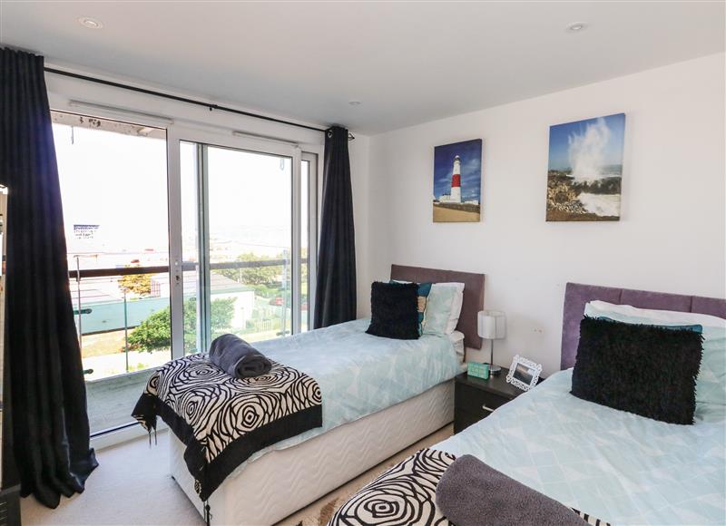 One of the bedrooms at 65 Ocean View, Castletown