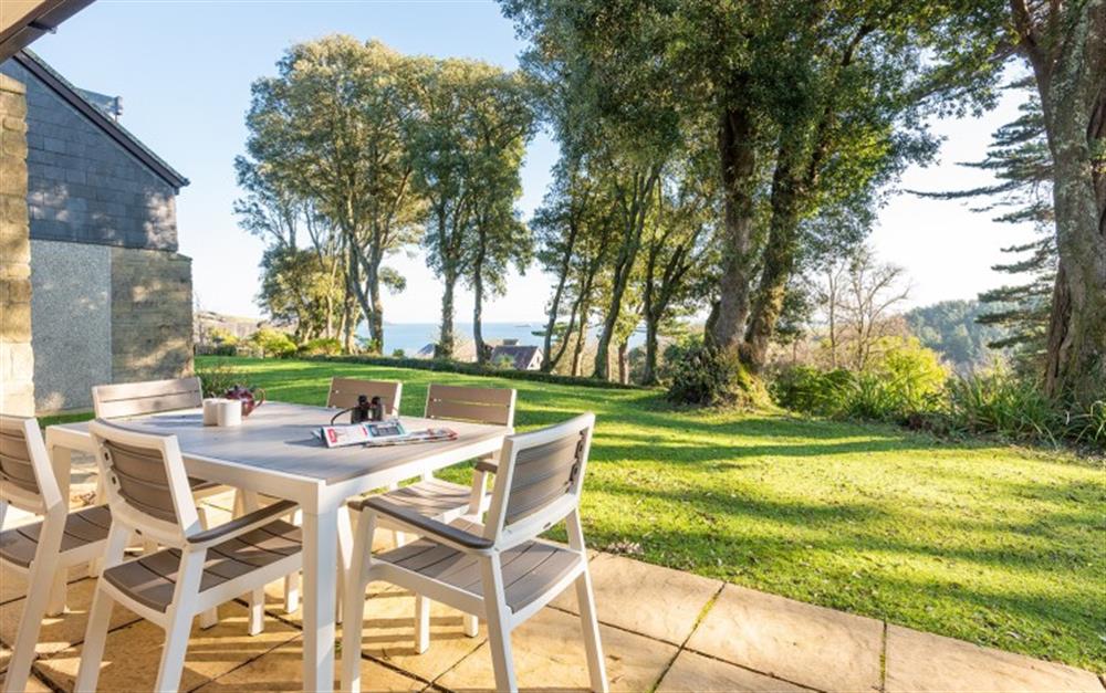 Enjoy relaxing outside on the patio at 67 Lower Maen Cottage in Maenporth