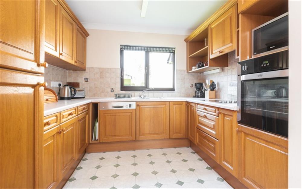 The kitchen has full size integrated appliances. at 67 Lower Maen Cottage in Maenporth