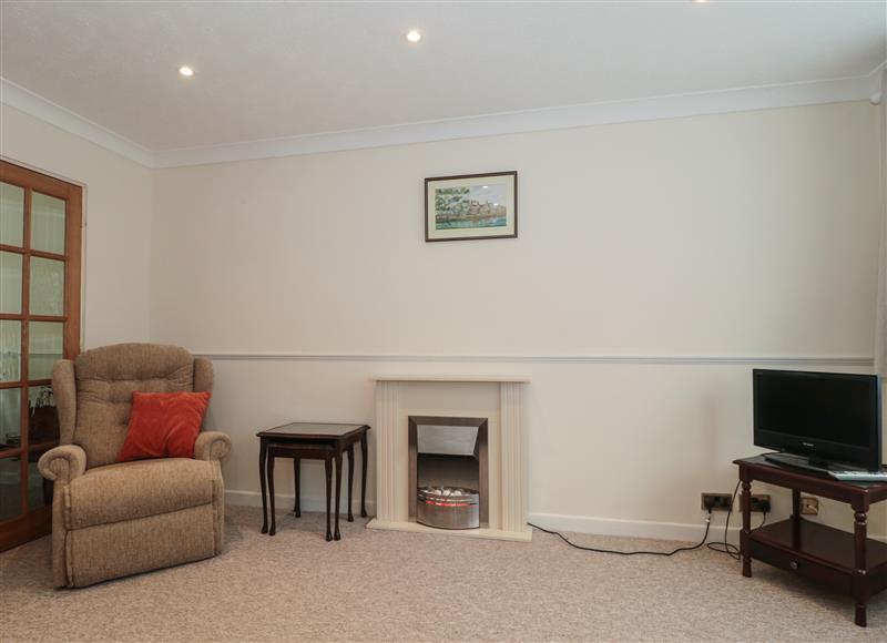 Relax in the living area at 7 Bindon Lane, Wool