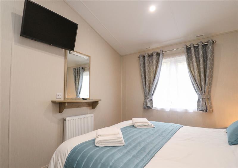 This is a bedroom at 7 Conniston Drive, Warton near Carnforth